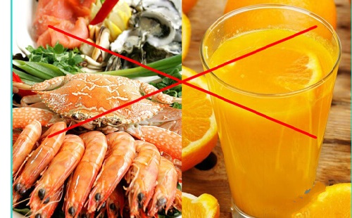 Ăn hải sản có nên uống nước cam 